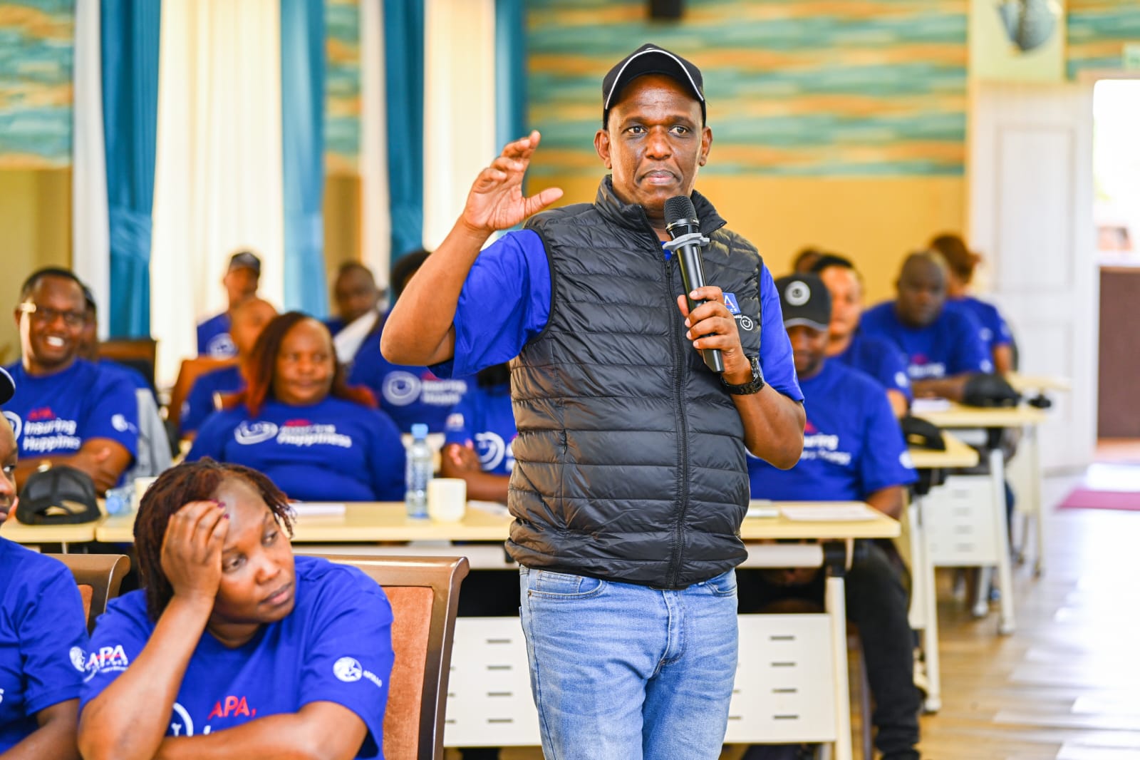 James Waweru with his sales team
